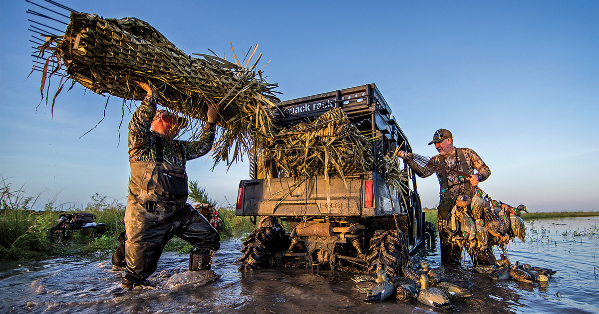 Waterfowl hunters loading up their side-by-side with gear. Photo by Todd J. Steele